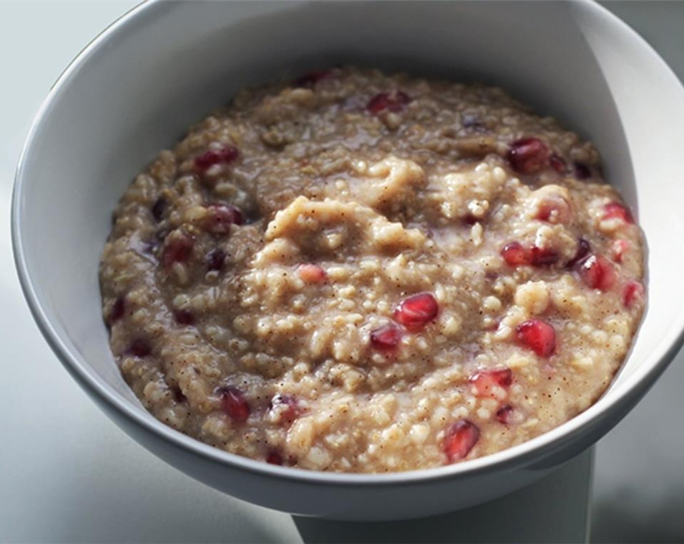 step 4 When the oats and water have started to bind, add the Ground Cinnamon (1 tsp) and Vanilla Bean Paste (1 Tbsp). When it's almost fully cooked then add the Pomegranate Seeds (1/3 cup).