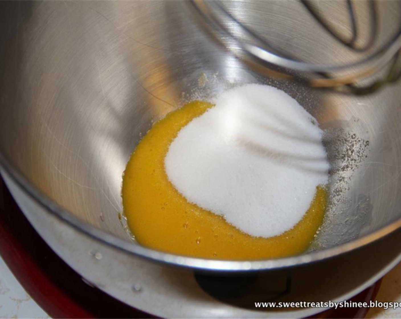 step 2 In a separate bowl, slightly beat yolks of the Eggland's Best Classic Eggs (2) and add Granulated Sugar (4 Tbsp). Continue to whisk until the mixture is pale white and sugar is mostly dissolved.
