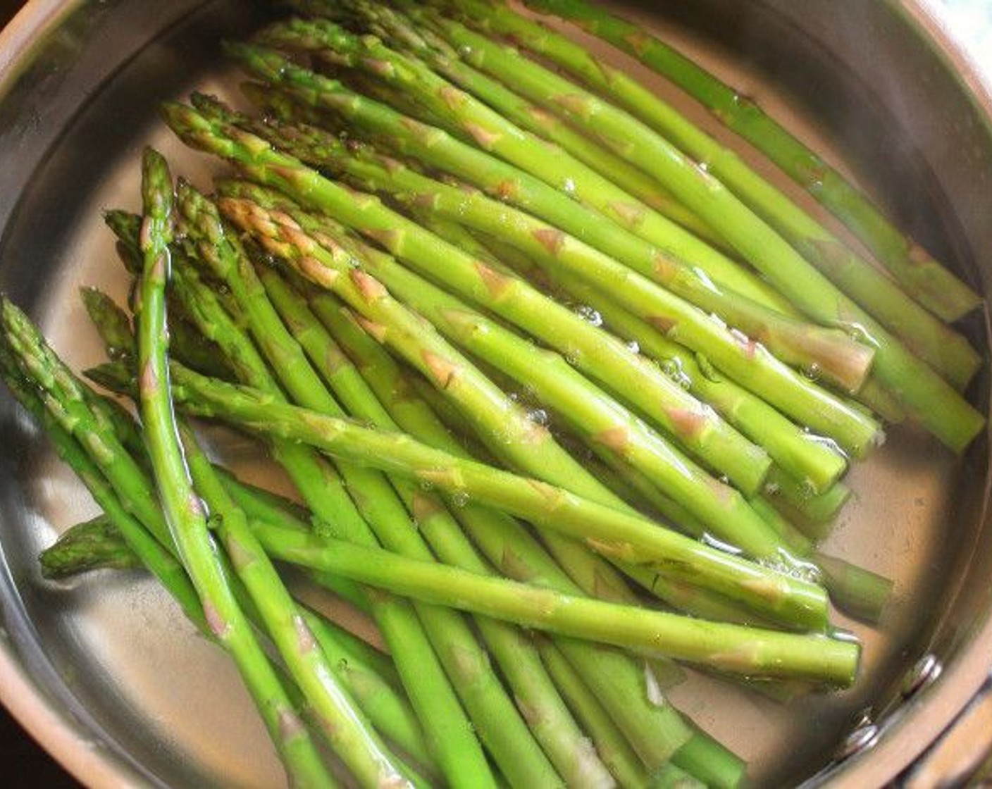 step 3 While the belly cooks, blanch, shock, and drain Asparagus (3 cups).