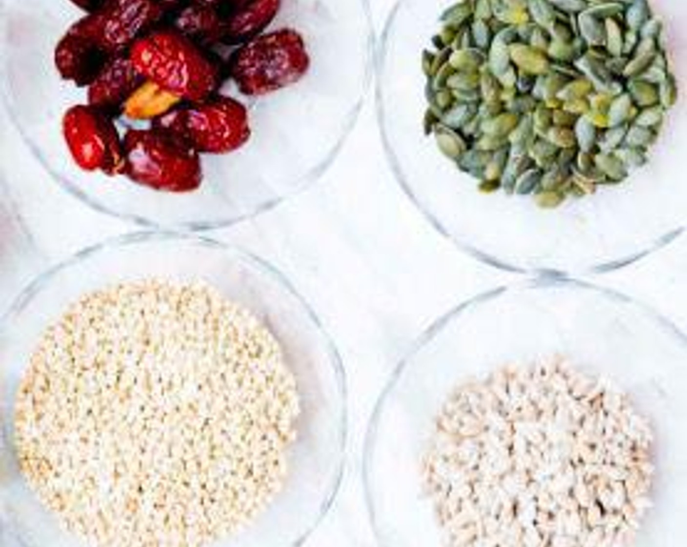 step 1 Soak the Buckwheat Groats (1/2 cup), Pepitas (4 Tbsp), Sunflower Seeds (4 Tbsp), and Dried Red Dates (1/2 cup) in water for 3 hours.