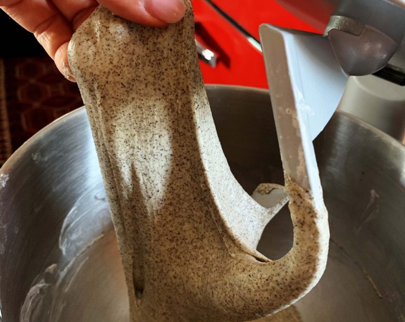 step 2 The next day, slowly add the remaining Water (2 oz) while mixing. Once the mixture starts coming together, add Salt (1/2 tsp) and Extra-Virgin Olive Oil (0.5 oz). Mix until the dough is shiny and elastic.
