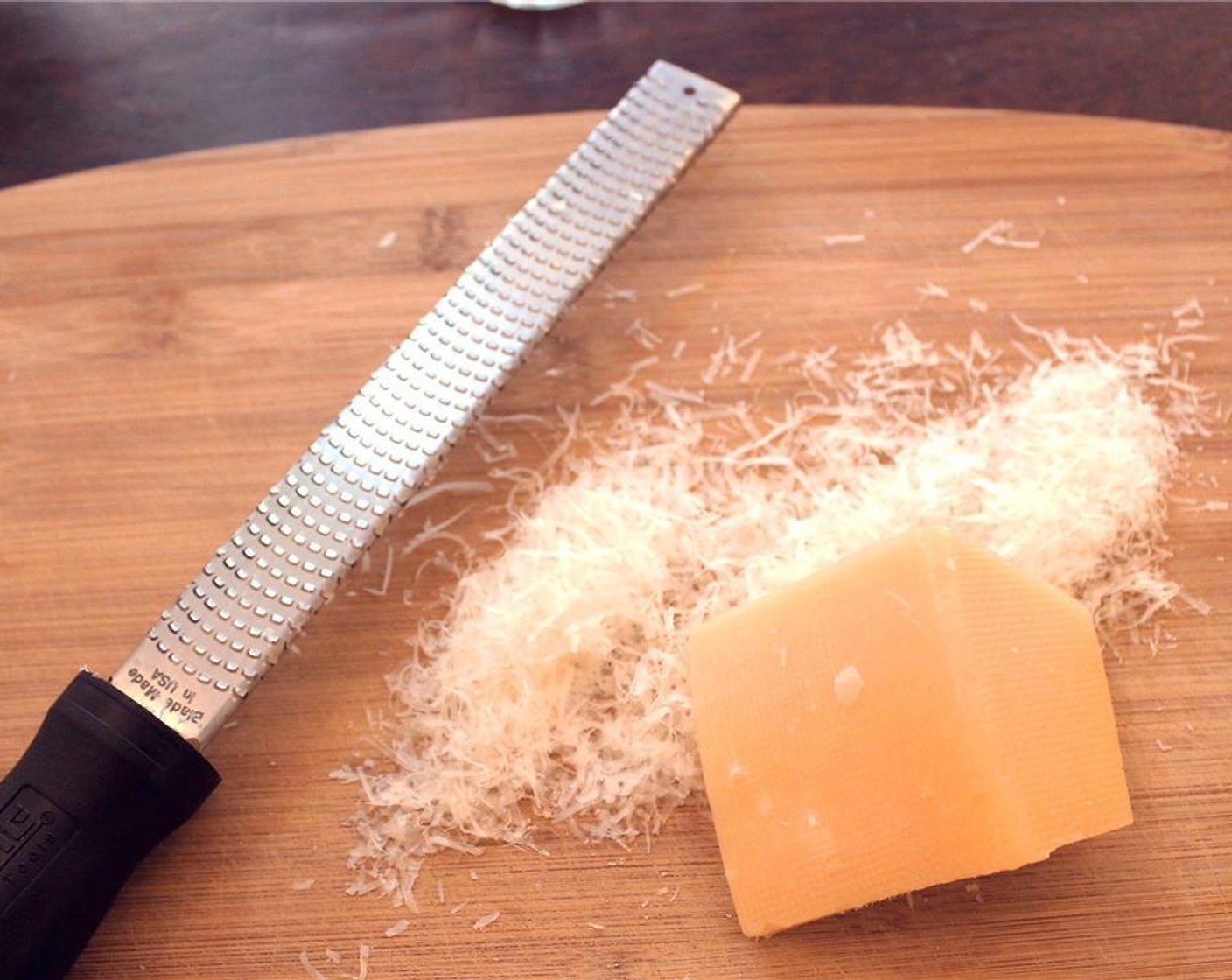 step 7 Grate the Parmesan Cheese (1/2 cup)  and set aside.