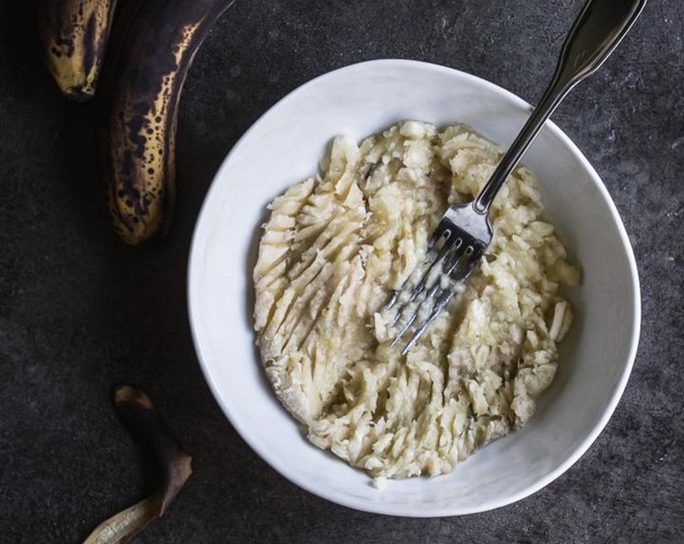 step 5 Add the Bananas (1 1/2 cups) the bowl of the stand mixer along with the Neutral Oil (1/2 cup), Non-Dairy Milk (1/4 cup) and Vanilla Extract (1 Tbsp). Mix until well combined.