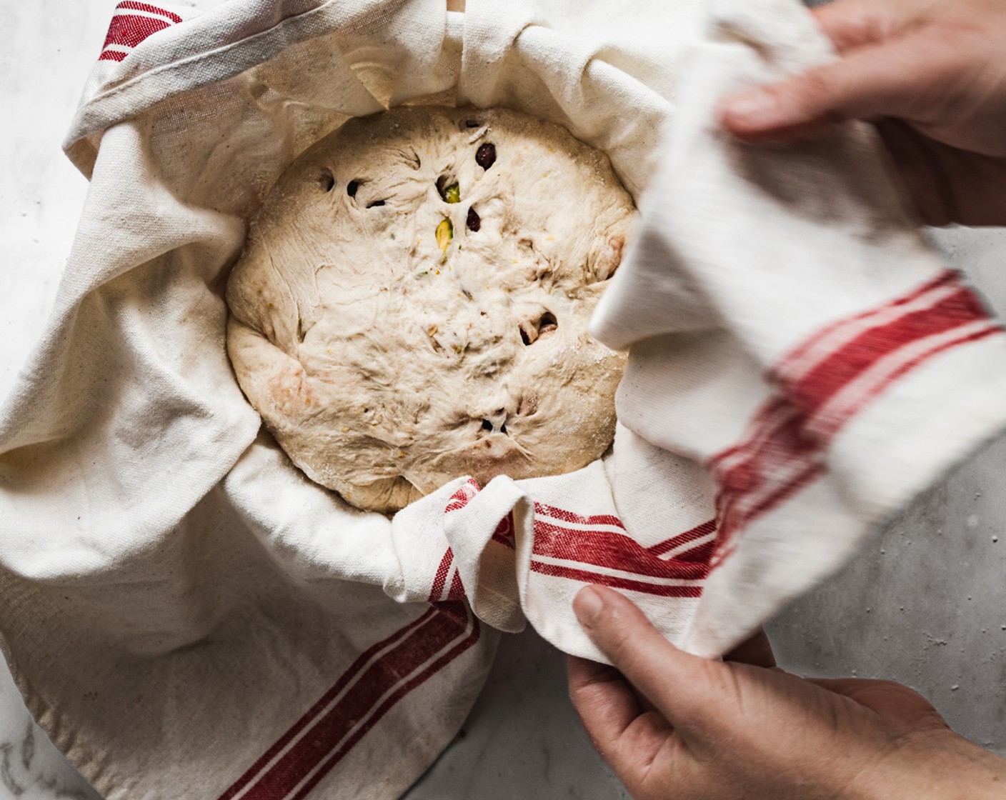 step 9 Repeat folding dough in the bowl. Cover and let rise until smooth, soft, and doubled in size, about 30 minutes more.