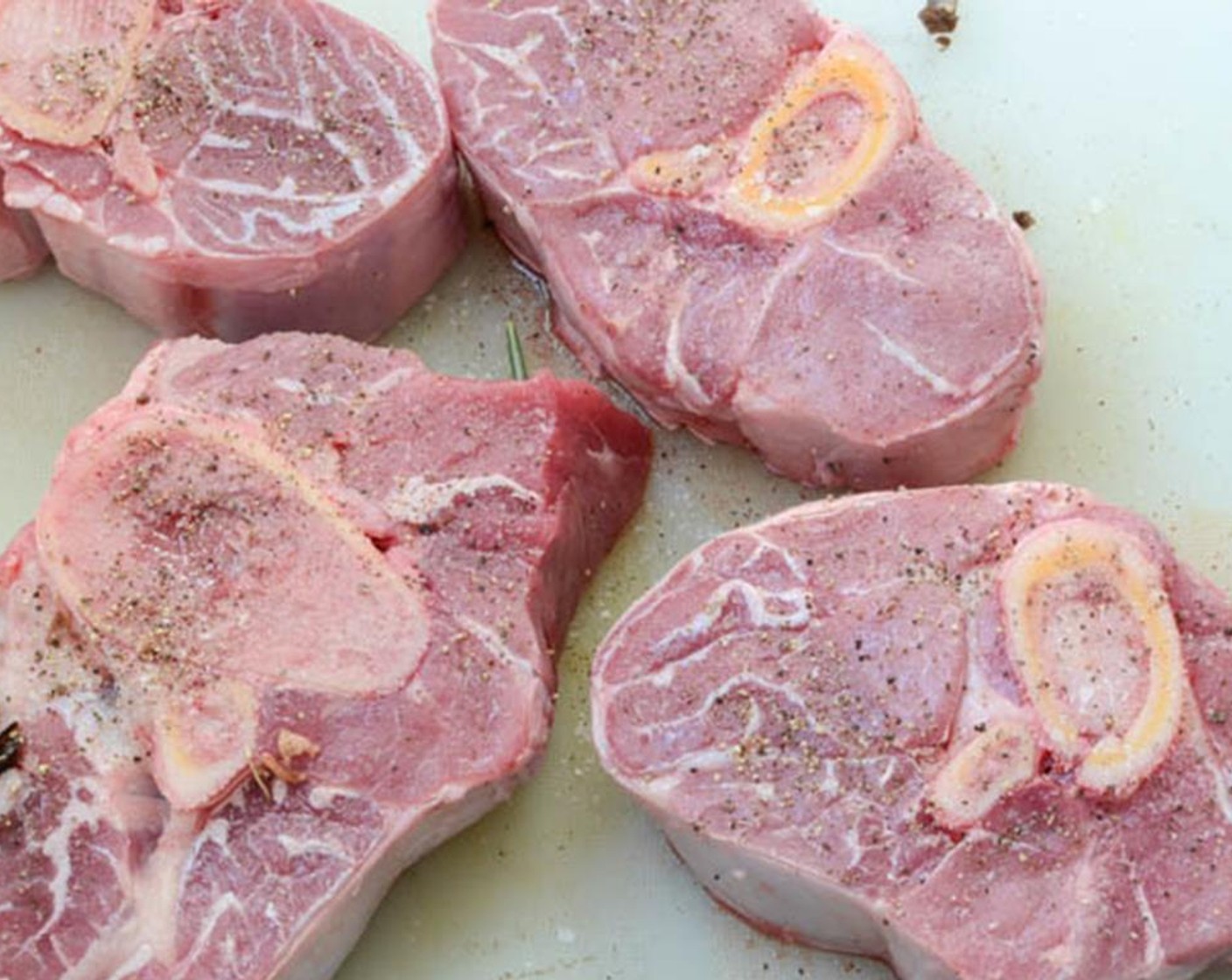 step 2 With a paper towel, pat dry the Crosscut Veal Shanks (2.5 lb). In a small bowl, mix Ground Black Pepper (1/2 tsp) and Kosher Salt (1/2 tsp)  Sprinkle both sides of the veal with salt and pepper.