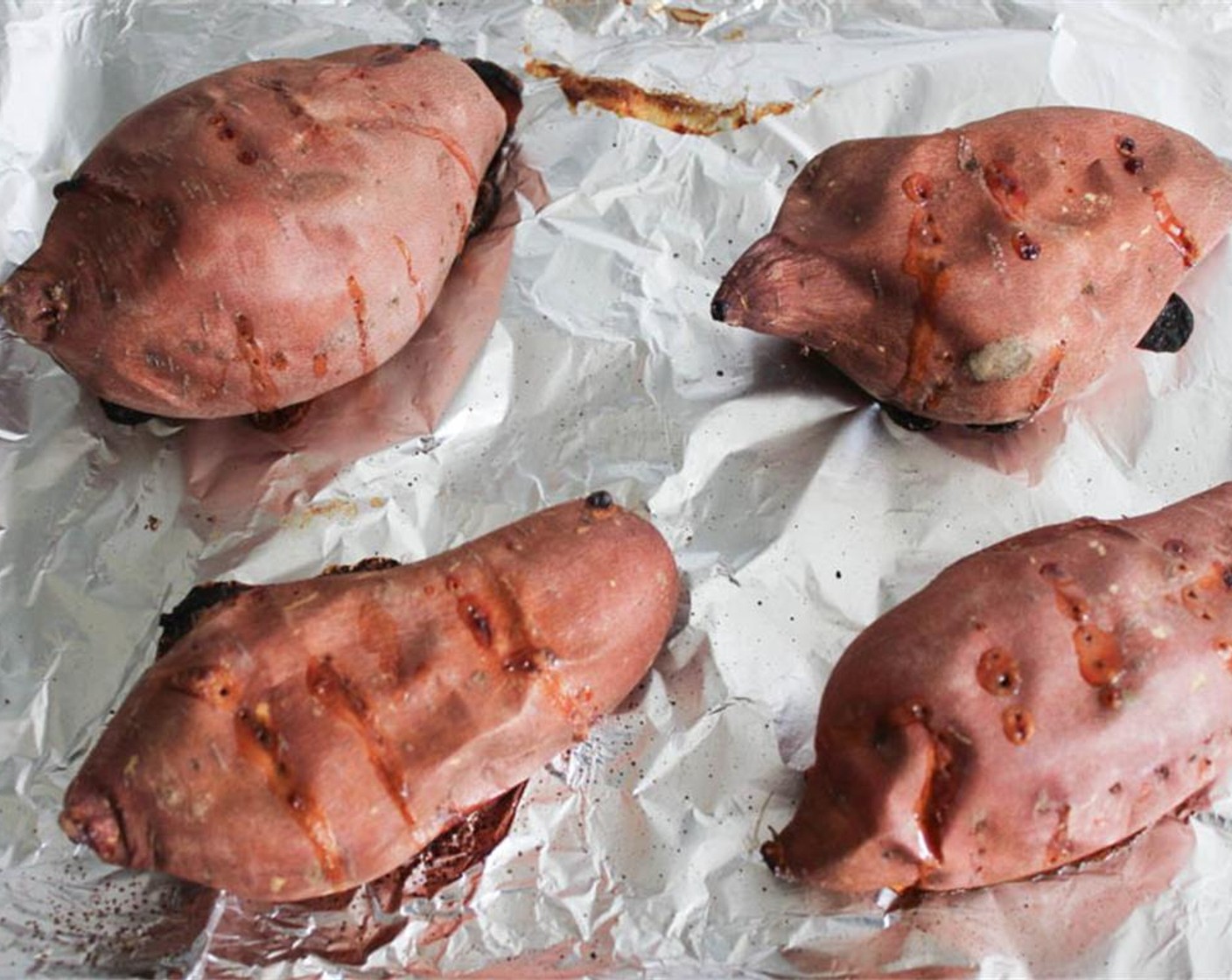 step 3 Transfer the potatoes to the oven and bake for 60-70 minutes until they’re very tender.