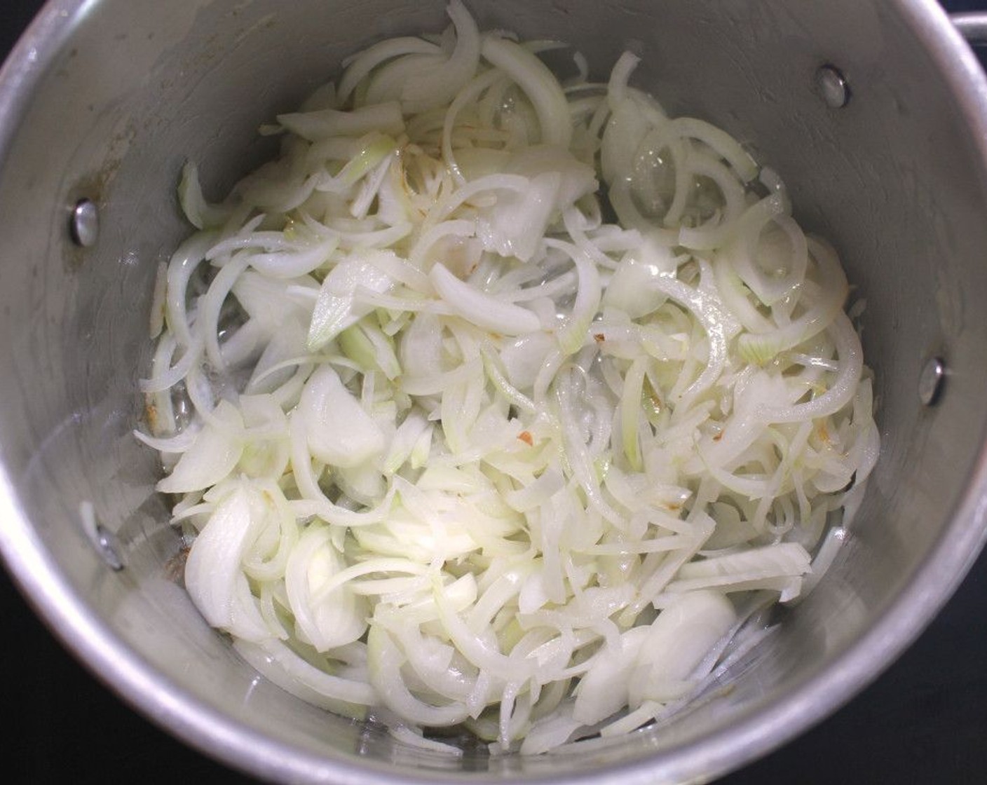 step 1 Sauté Onions (3 3/4 cups) in Sunflower Oil (2 Tbsp).