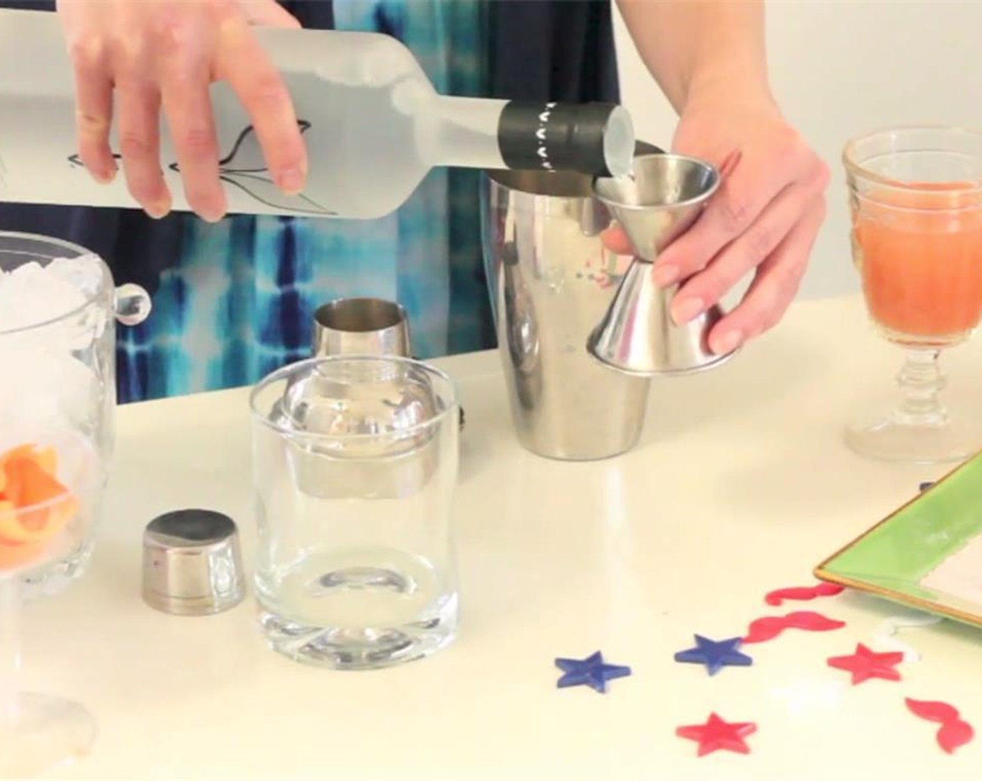 step 2 Pour the Grapefruit Juice, Caorunn® Gin (1.3 fl oz), VEEV® Spirit (0.8 fl oz), Grenadine Syrup (0.5 fl oz), and Orange Bitters (2 dashes) into a shaker tin. Add a few cubes of Ice (to taste), and close shaker.