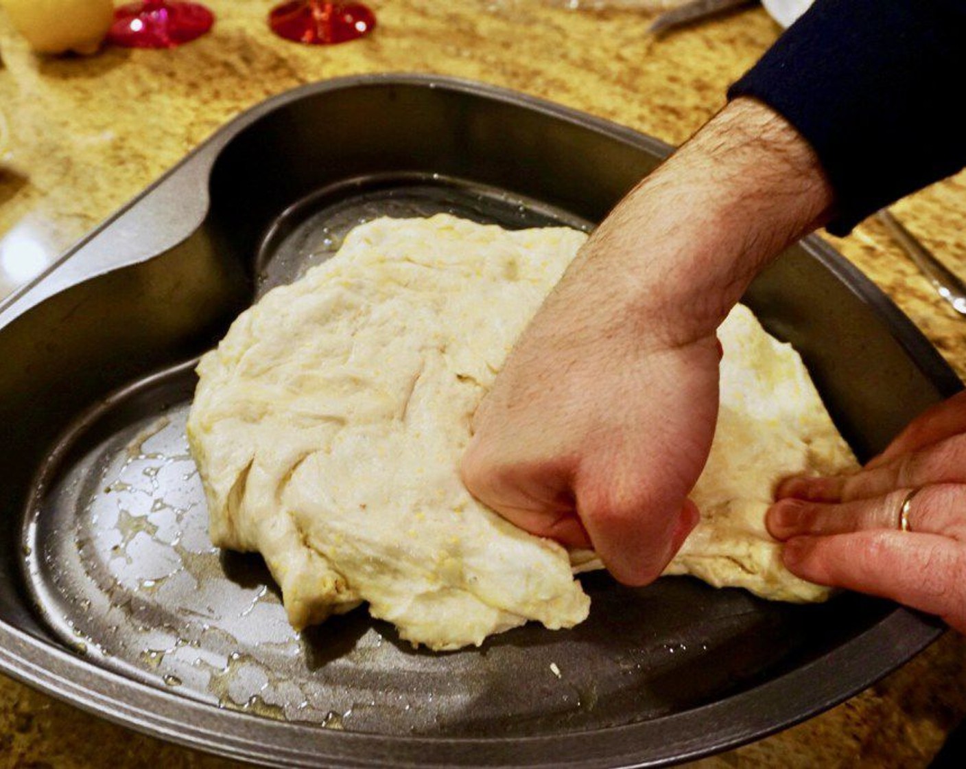 step 10 When you’re ready to assemble the pizza, oil the dough all over and lightly oil the pan as well. This will help the crust crisp up. Push the dough into the pan, trying to spread out as evenly as possible.