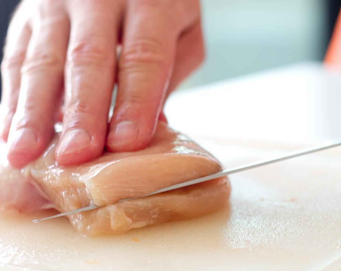 step 5 Halve each Chicken Breasts (4 pieces) horizontally, cutting them parallel to the counter.