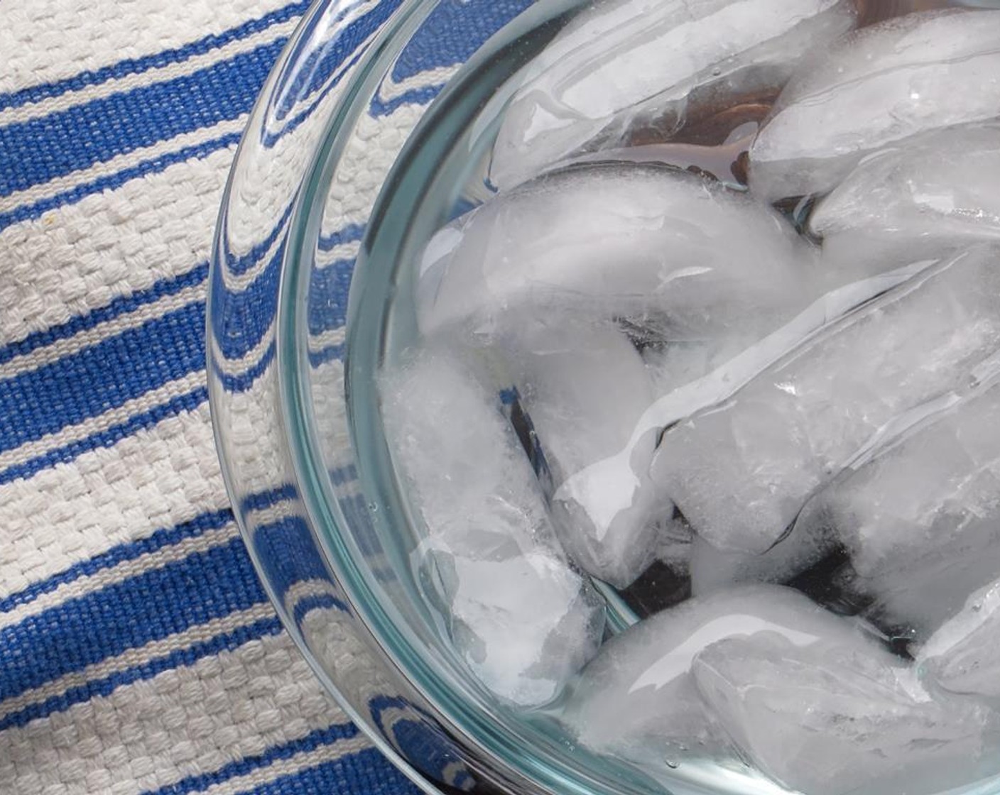 step 1 Create a water bath. Fill a medium bowl halfway with ice and water. Set aside.
