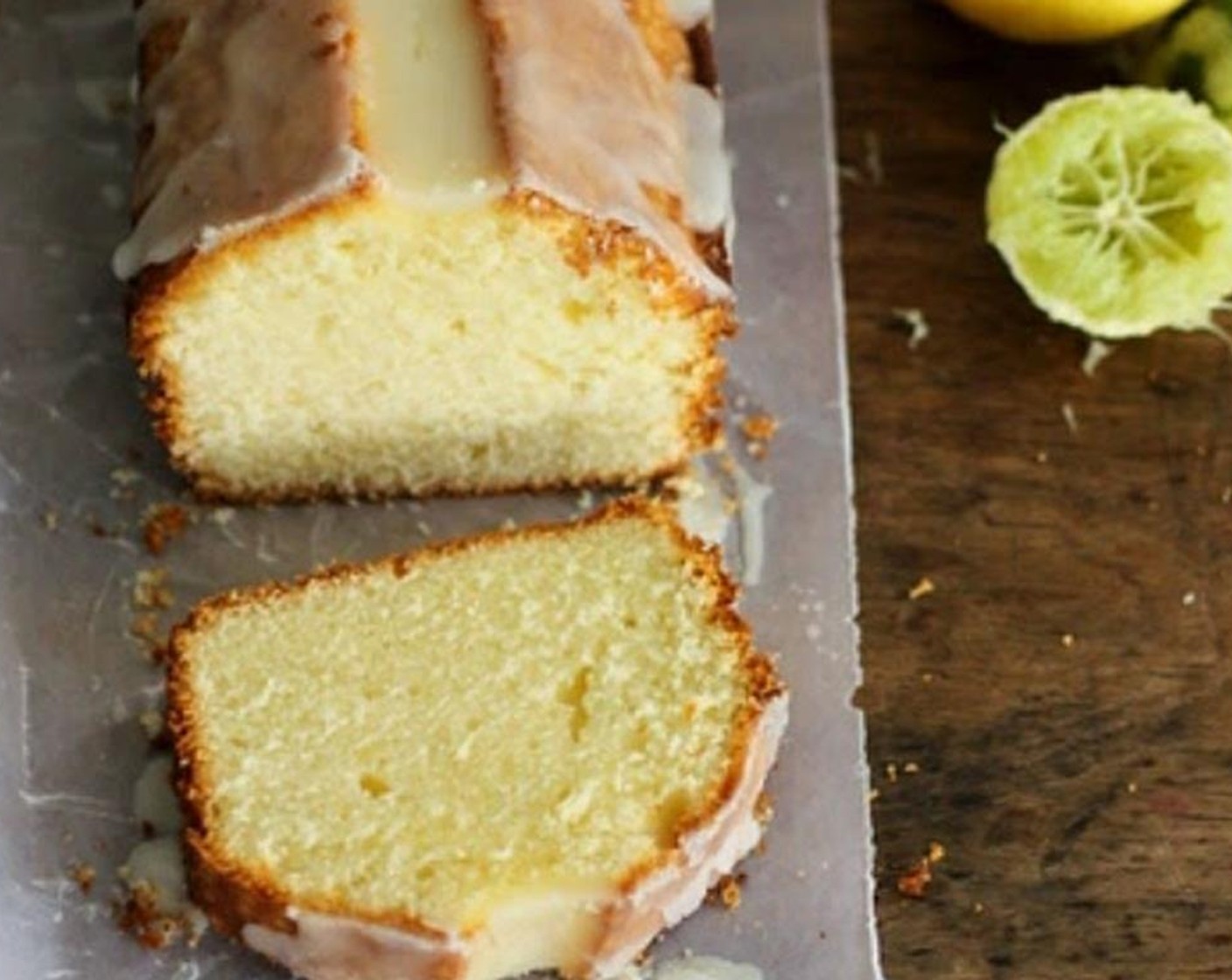 step 9 For the glaze, mix Powdered Confectioners Sugar (3/4 cup), juice from the Lime (1) and 1 Tbsp Lemon Juice until smooth. Pour slowly along the center of the cake, letting it slide to the sides. Serve and enjoy!