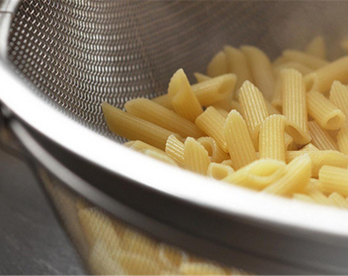 step 2 Bring a large pot of cold water to a boil. Season with Salt (to taste) and add the Penne Pasta (1 lb). Stir often and cook 2 minutes under suggested cooking time (it will finish in the oven). It should not be overly soft. Drain and set aside.