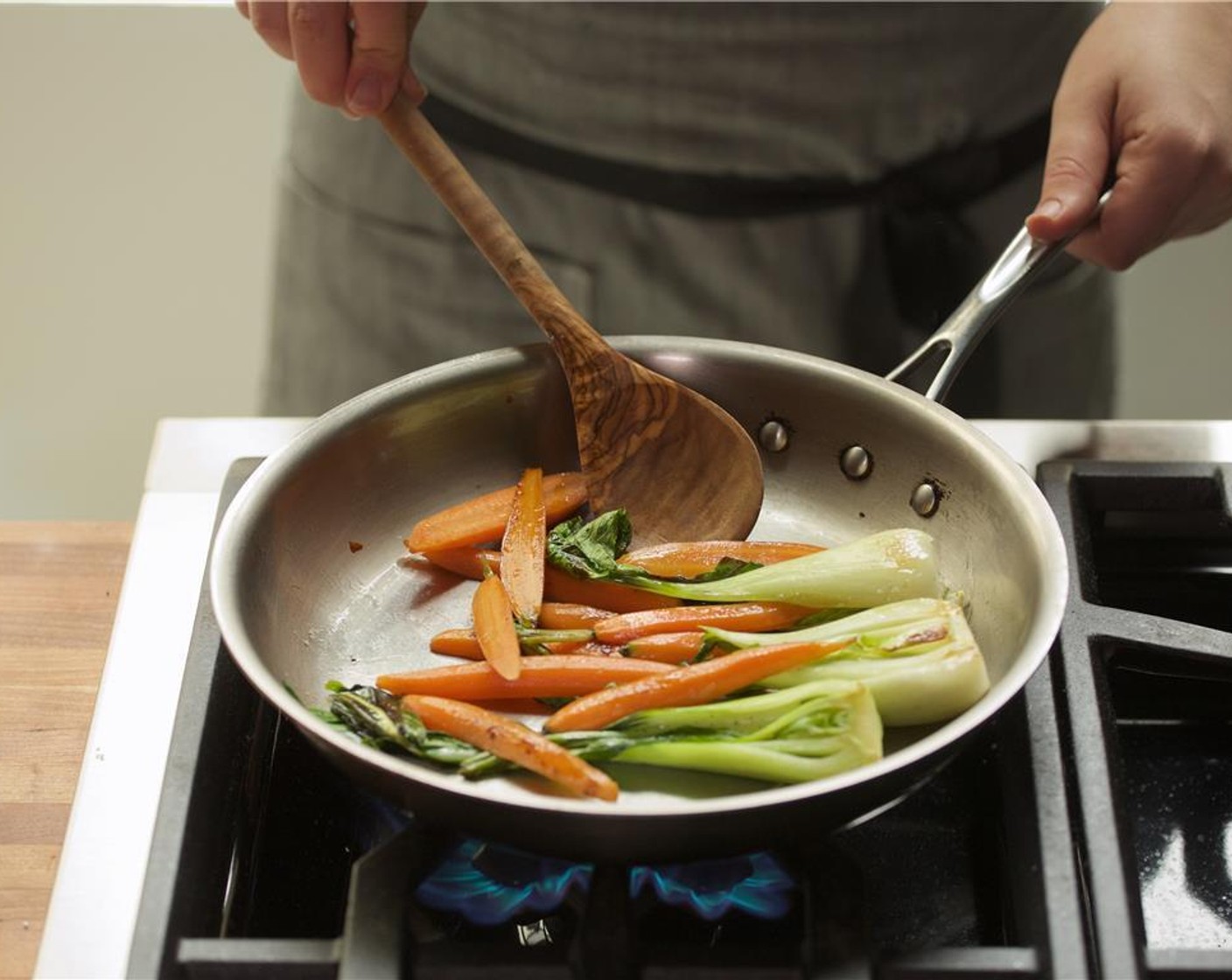 step 8 Add the carrots and Edamame (1 2/3 cups) and cook for an additional thirty seconds, stirring occasionally. Remove from heat and keep warm for plating.