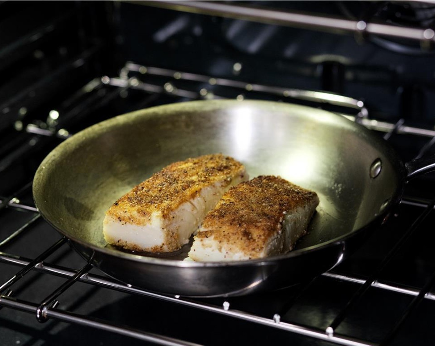 step 12 Turn the fillets over and bake crust side down until the fish flakes easily with a fork, about five minutes.