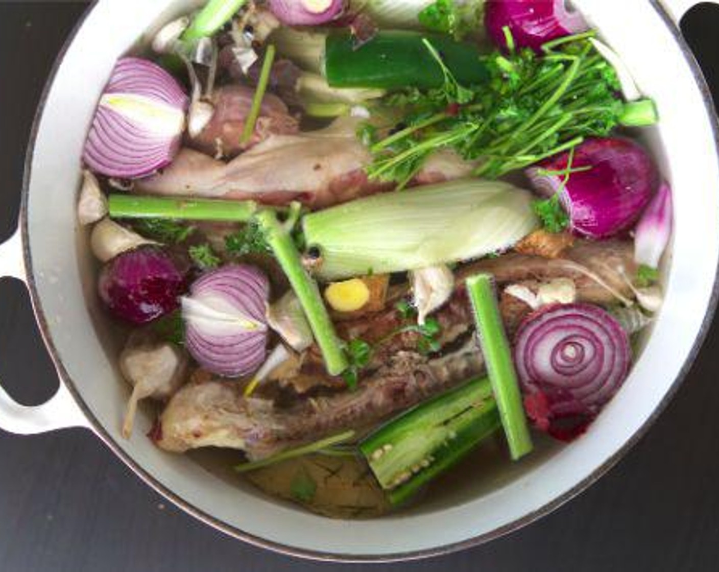 step 1 Add Chicken Backbones (5), Fennel Bulb (1 bulb), Onion (1), Bay Leaf (1), Black Peppercorns (1 Tbsp), Fresh Ginger (3 in), Garlic (1 head), and Jalapeño Pepper (1) to a stock pot. Cover with Water (to taste).