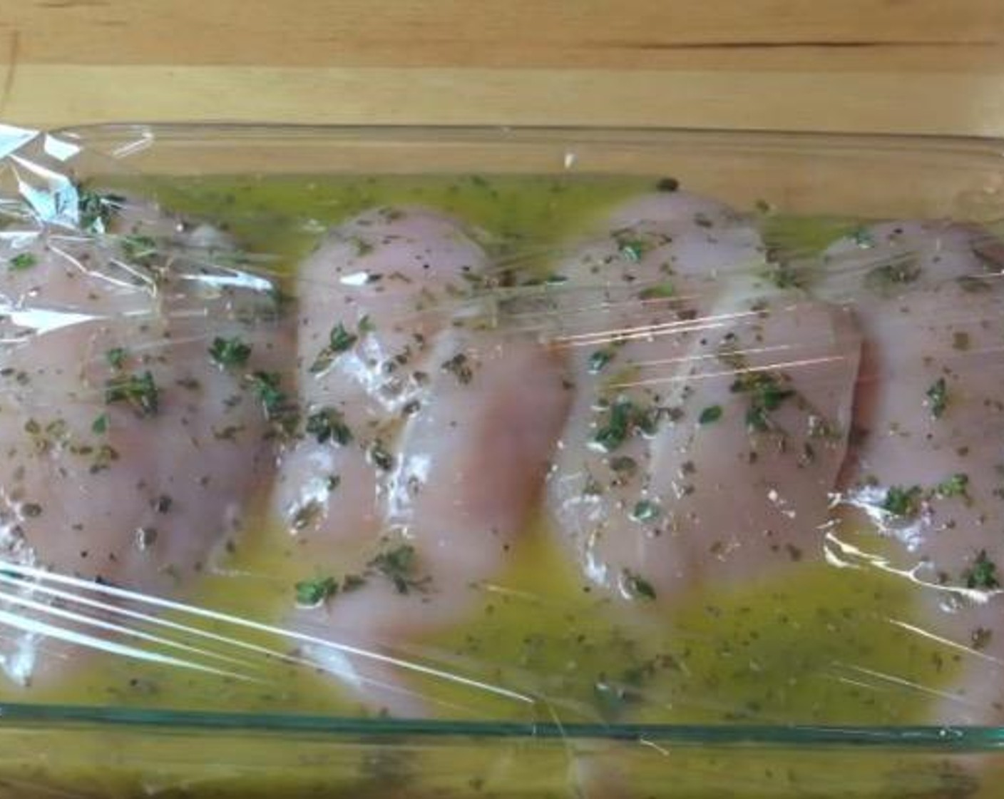 step 2 In a baking dish, add Chicken Breasts (4). Pour the marinade over the chicken. Cover dish in plastic wrap and place in fridge for 3 hours, turning occasionally.