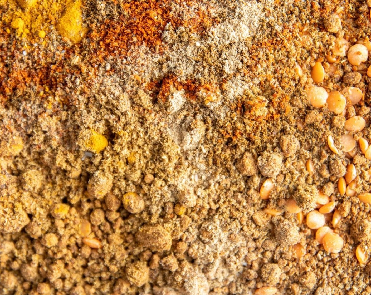 step 3 Into a blender cup, add dried yellow split peas, Jaggery (4 Tbsp), Ground Turmeric (1 Tbsp), Ground Cumin (2 tsp), Ground Coriander (2 tsp), Red Chili Powder (1 Tbsp), Garam Masala (1 Tbsp), Mango Powder (2 tsp), and Salt (1 Tbsp). Blend until you have a fine powder.