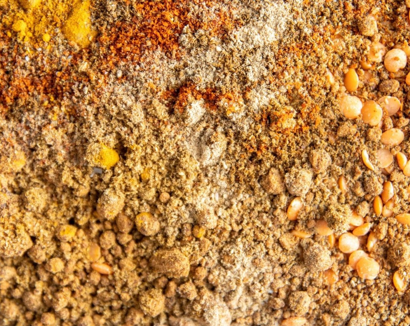 step 3 Into a blender cup, add dried yellow split peas, Jaggery (1/4 cup), Ground Turmeric (1 Tbsp), Ground Cumin (1/2 Tbsp), Ground Coriander (1/2 Tbsp), Red Chili Powder (1 Tbsp), Garam Masala (1 Tbsp), Mango Powder (1/2 Tbsp), and Salt (1 Tbsp). Blend until you have a fine powder.