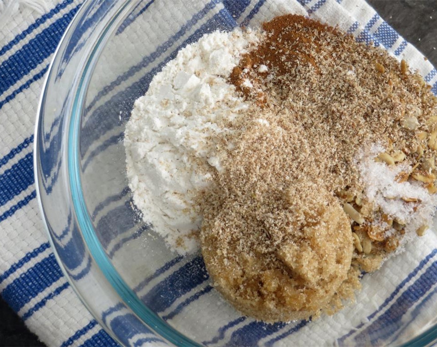 step 8 To make the streusel, in a small bowl, whisk together the Granola (1/2 cup), Brown Sugar (1/4 cup), All-Purpose Flour (1/4 cup), Ground Cinnamon (1/2 tsp), Whole Nutmeg (1/2 tsp), and Fine Sea Salt (1/4 tsp) in a small bowl.