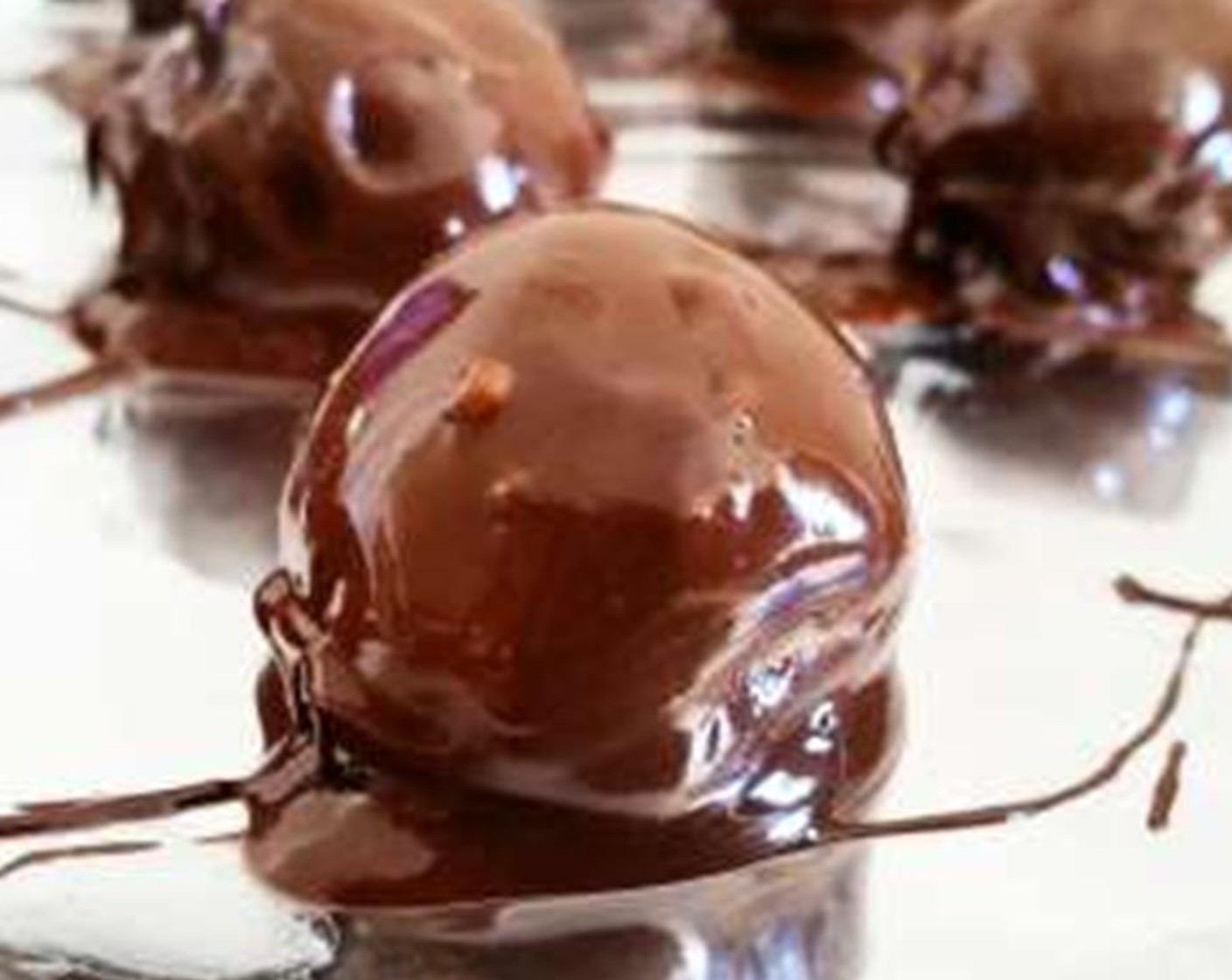 step 4 Dip the peanut butter balls into the chocolate and coat them completely. Remove from chocolate and allow to set for 20-30 minutes. Enjoy!