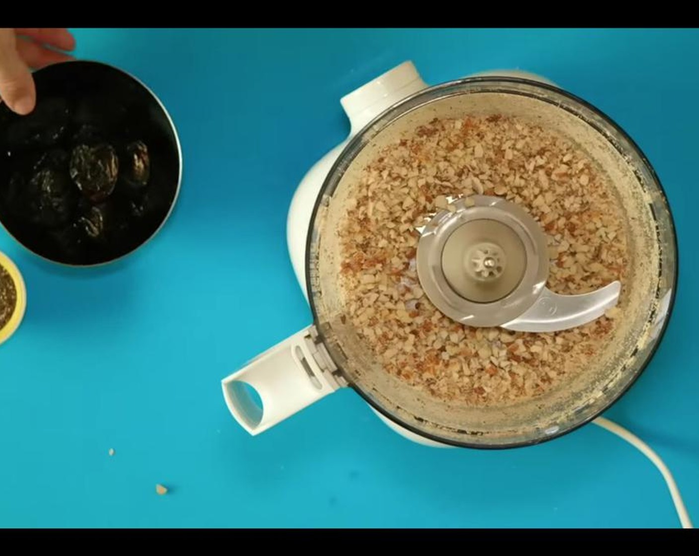 step 1 In a food processor, process Almonds (1/2 cup) until coarsely ground.