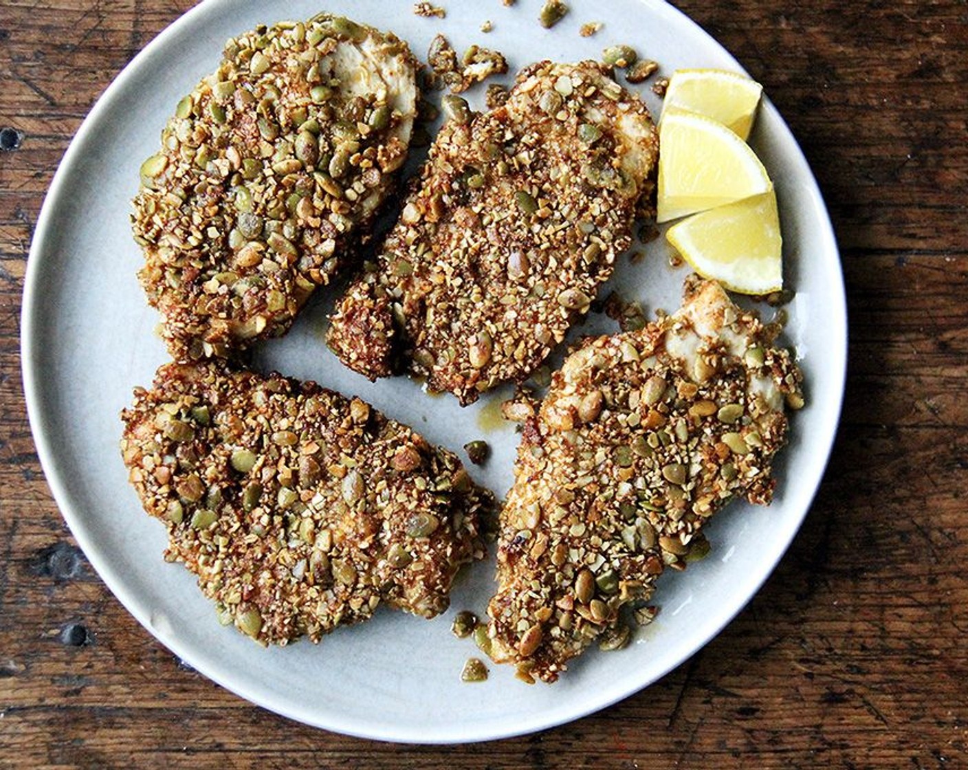 step 10 Transfer breasts to a platter to rest. Let rest 5 minutes before slicing and serving. Slice a wedge out of the Lemon (1) and serve with the chicken cutlets and enjoy!