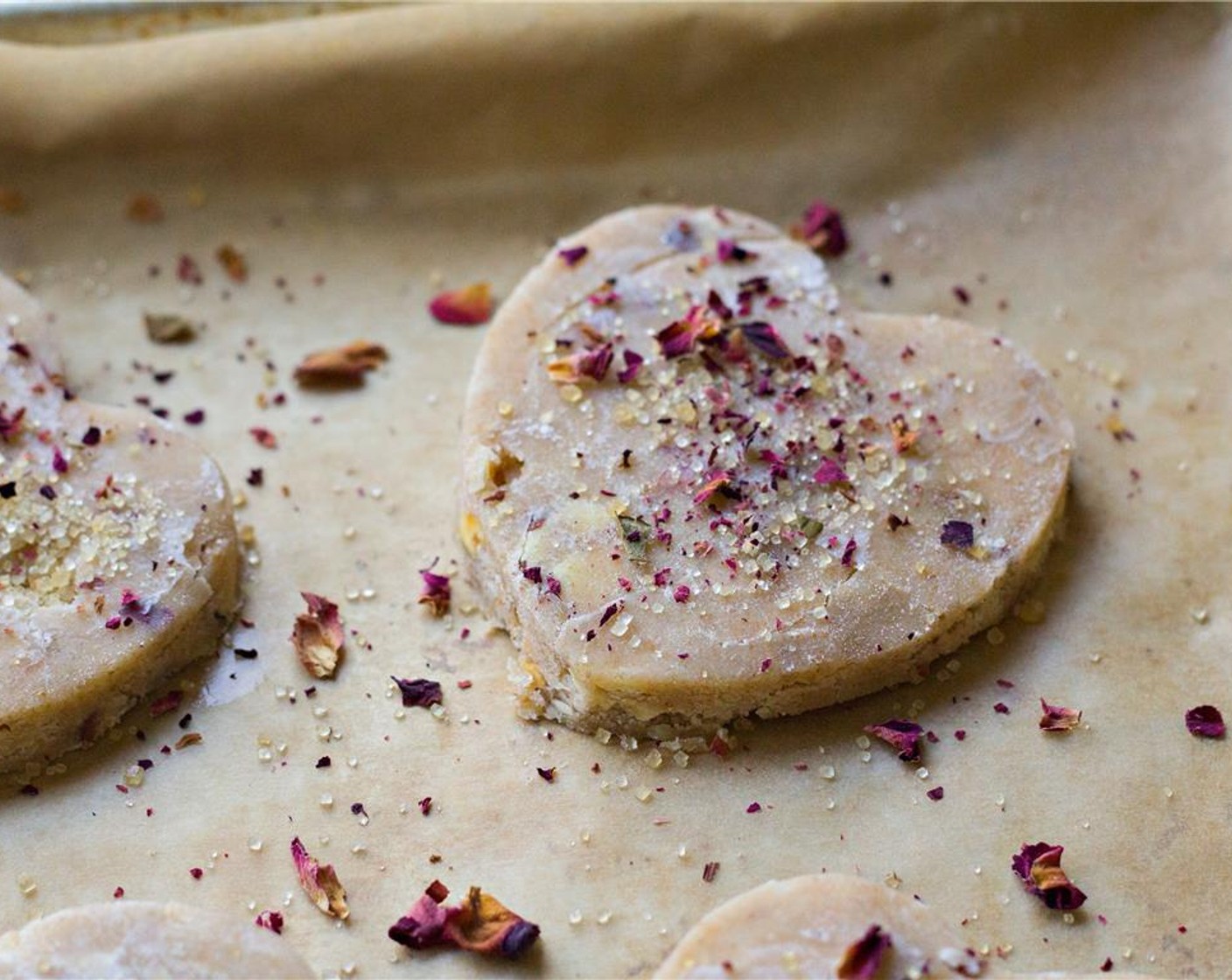 step 10 Sprinkle cookies individually with additional rose petals and Raw Cane Sugar (to taste).