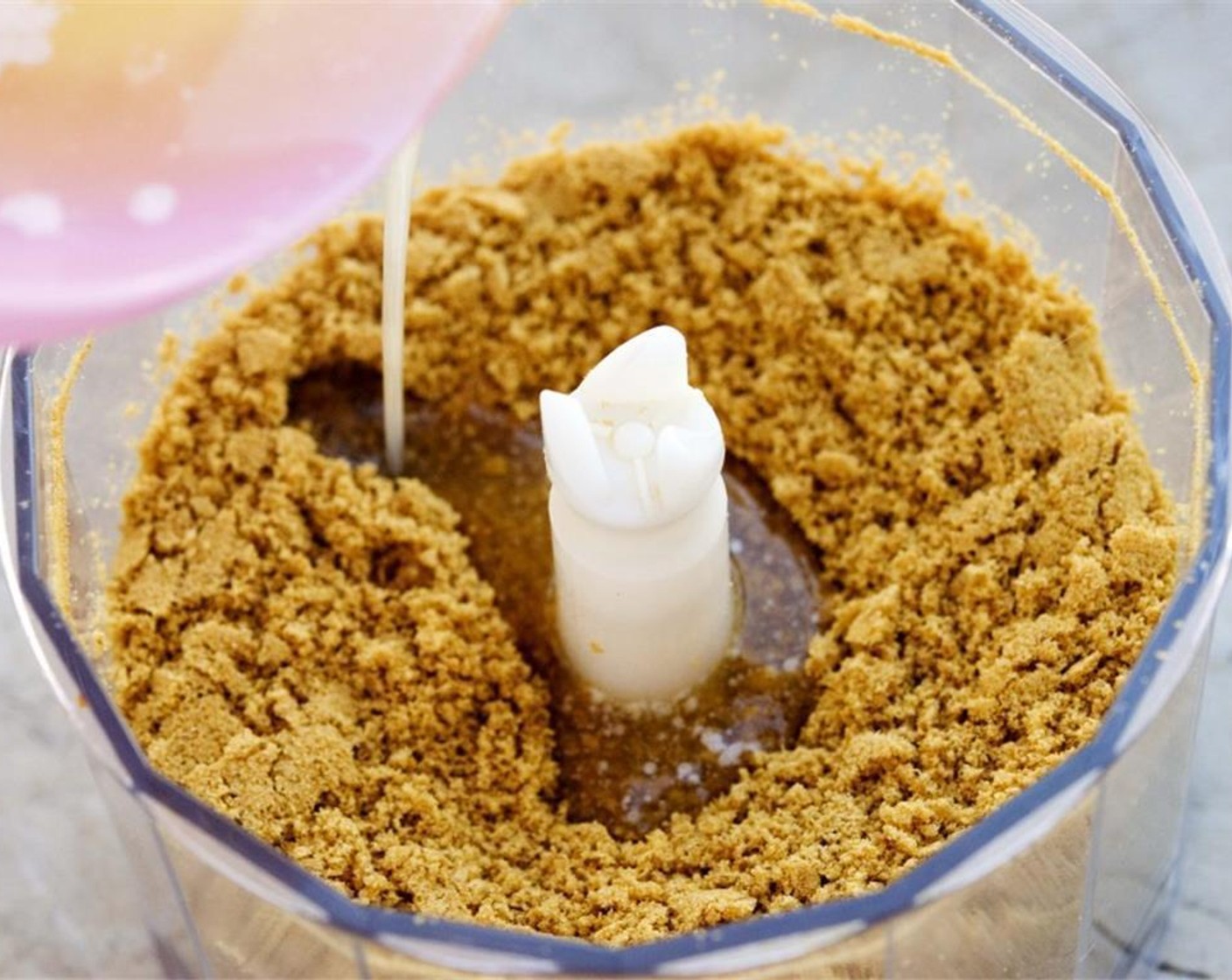 step 3 Melt the Unsalted Butter (4 Tbsp) and pour it into the processed cookies. Stir it in well.