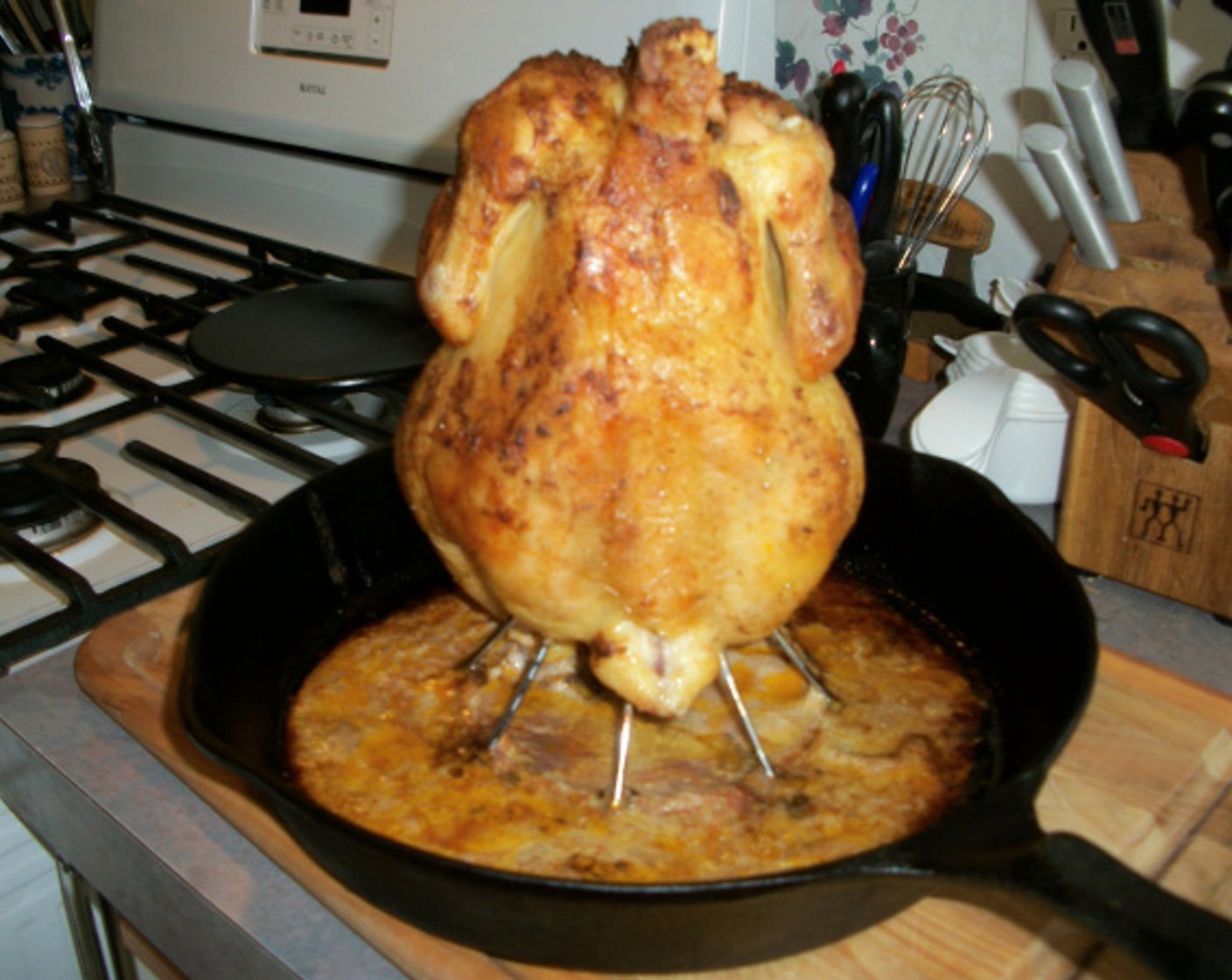 step 9 Carve chicken into serving pieces and serve with the gravy and sides of your choice.