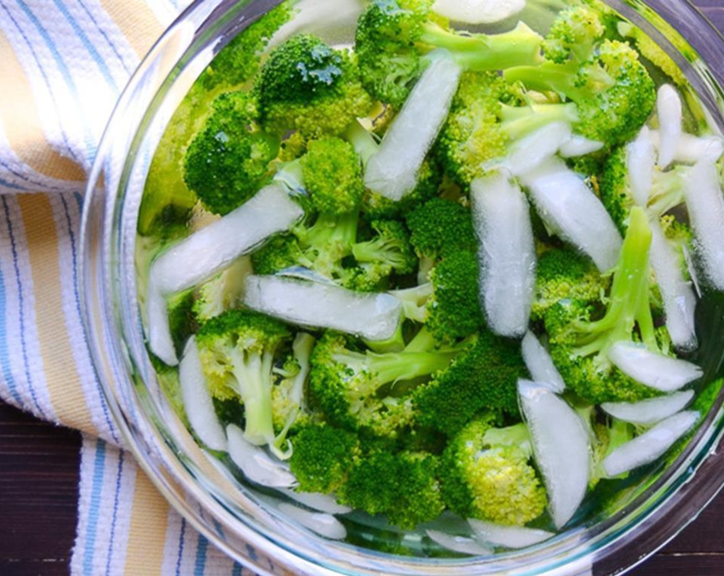 step 5 Use a slotted spoon or spider to transfer the broccoli from the boiling water to the ice bath to shock it.