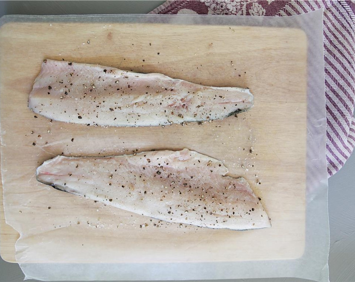 step 2 Lower heat to medium-low and cook 25-30 minutes. Season the Trout Fillet (1 lb) with Cayenne Pepper (to taste), Kosher Salt (to taste) and Ground Black Pepper (to taste).