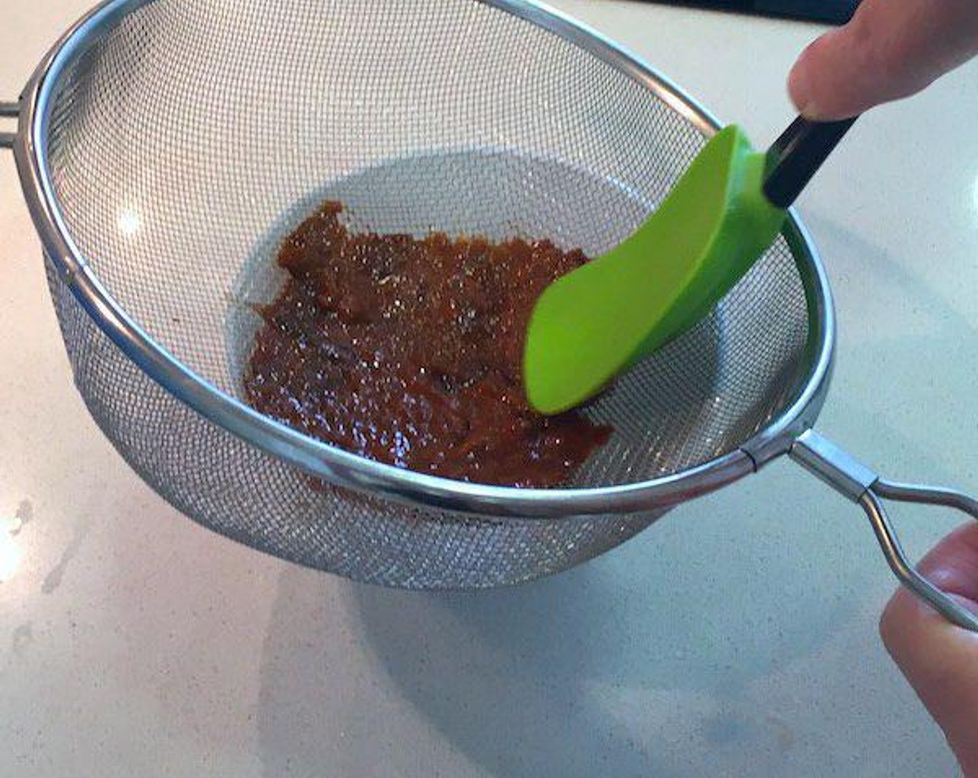 step 2 Place Sea Urchins (4) in a fine sieve and press through the mesh into a bowl using a rubber spatula.