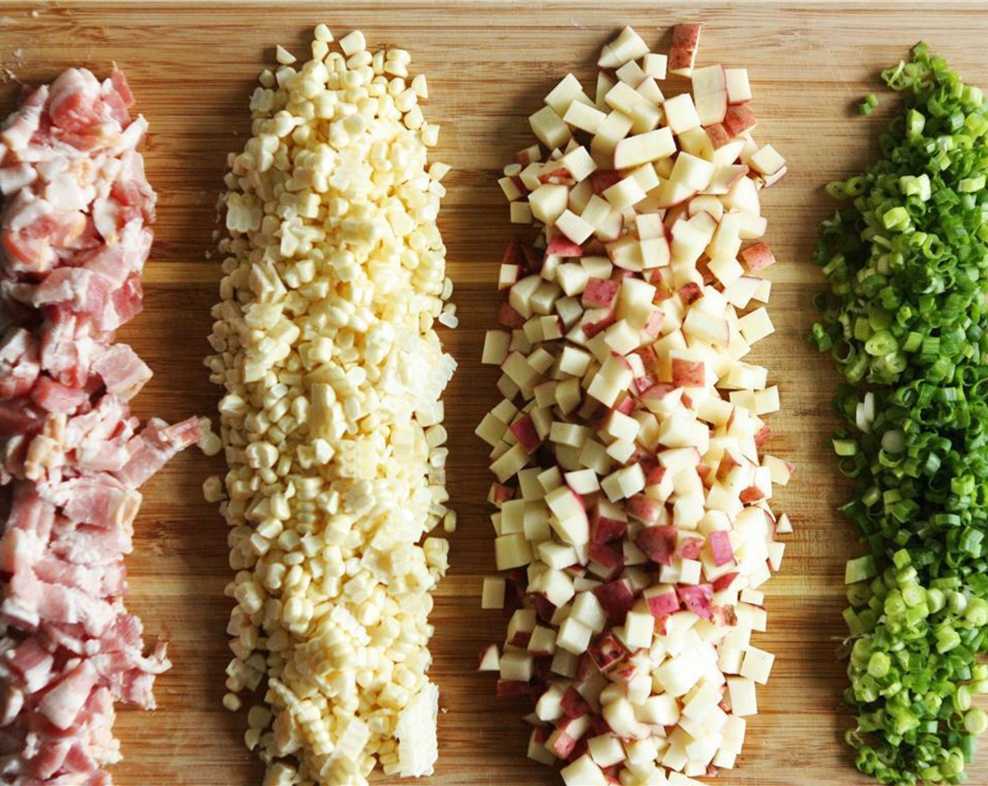 step 1 Thinly slice the Scallion (1 bunch). Cut the Red Potatoes (3 cups) into small cubes. Cut the kernels from the Corn (2 ears). Dice the Thick-Cut Bacon (6 slices).