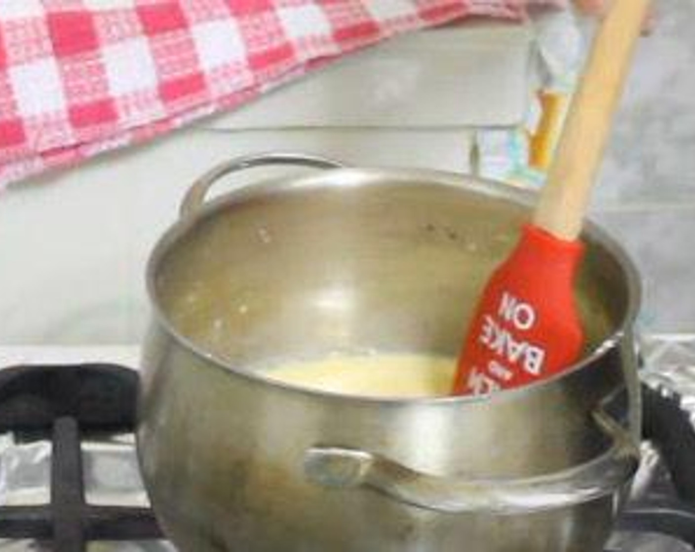 step 1 In a heavy-bottomed saucepan over medium-high heat, add Whole Milk (2 cups), Eggland's Best Classic Eggs (4), Granulated Sugar (1/2 cup), Vanilla Extract (2 tsp), Corn Starch (4 Tbsp), and Salt (1 pinch). Whisk together. Cook for 3-8 minutes, or until mixture thickens.