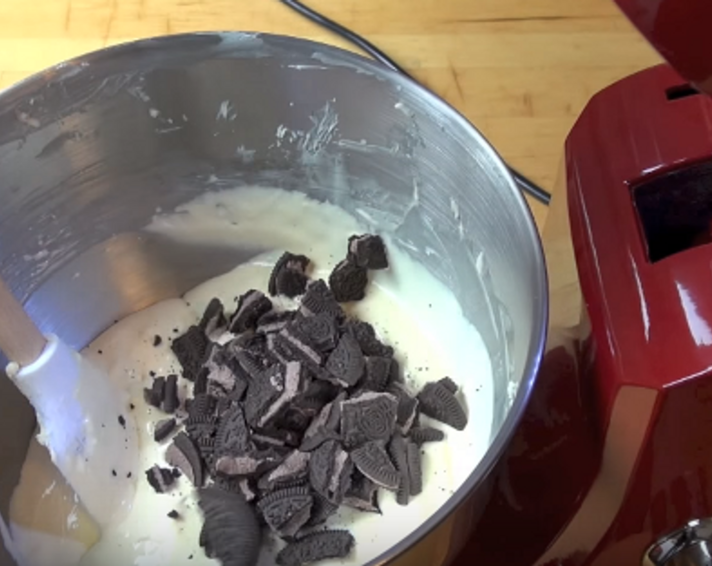 step 3 Beat in each Eggland's Best Classic Eggs (2) separately, then fold in eight of the Oreo® Chocolate Sandwich Cookies (20).