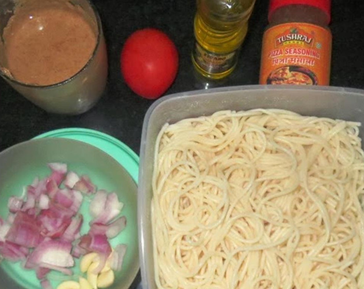 step 2 Cook Spaghetti (7 oz) according to package instructions. Reserve a 1/4 cup of the water for the sauce.