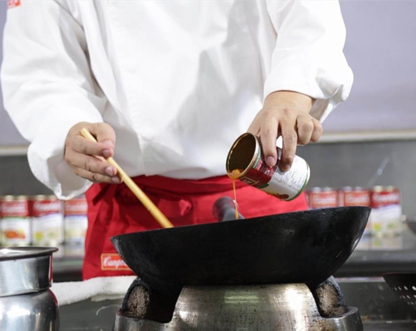 step 4 Add Campbell's Borsch Condensed Soup (1/2 cup), Chicken Stock (3 Tbsp), and White Wine (1 Tbsp) to the pan and cook for a minute.