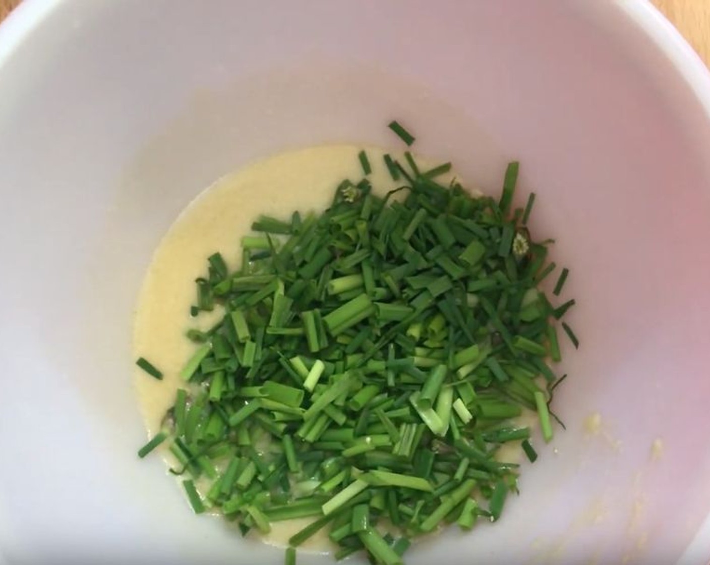 step 3 Whisk together the juice from the Lemon (1), Dijon Mustard (1 Tbsp), Extra-Virgin Olive Oil (2 Tbsp), and Maple Syrup (1 tsp) until it has emulsified, then stir in the Fresh Chives (4 Tbsp). Toss the veggies with the dressing using your clean hands.