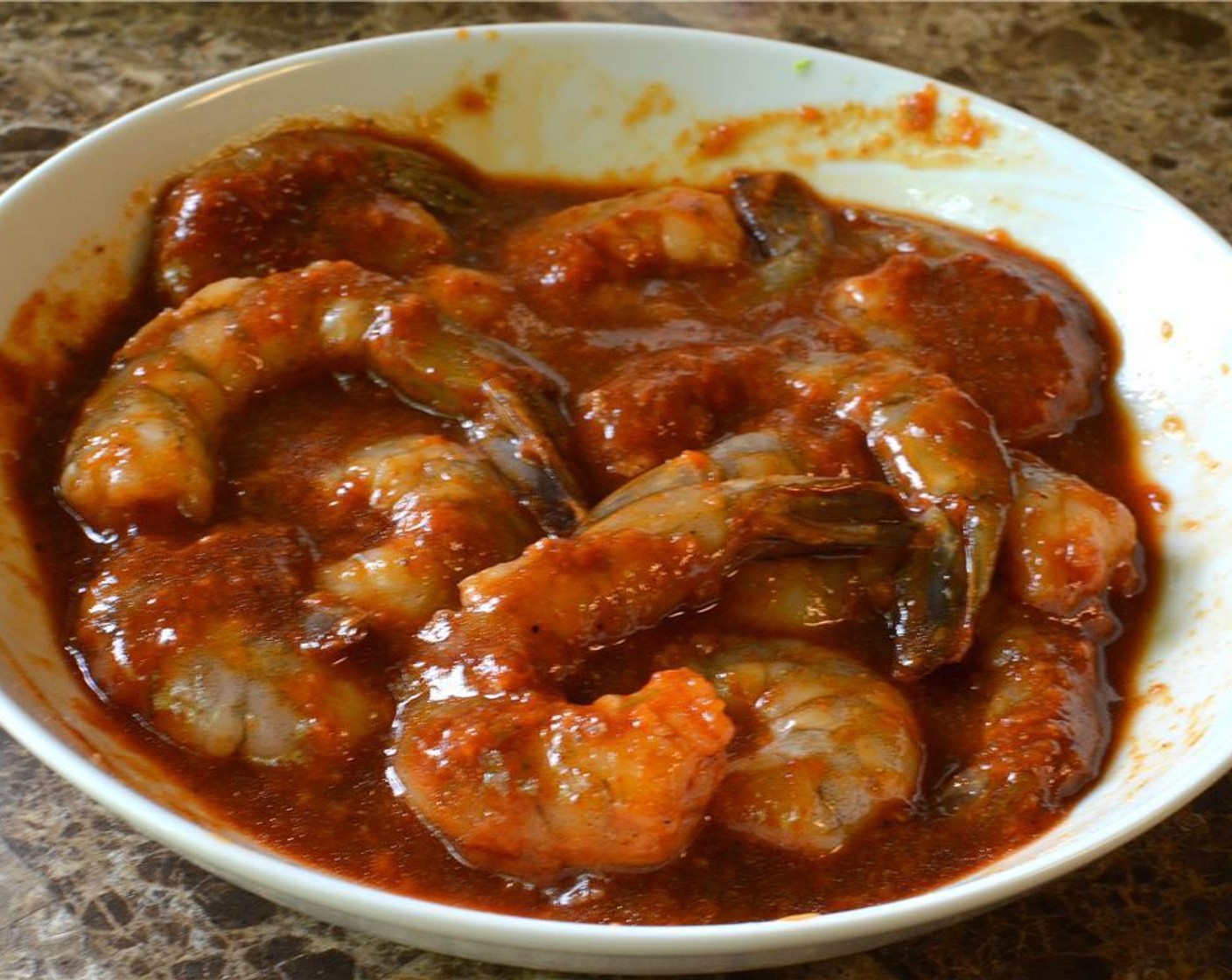 step 5 Toss the Jumbo Shrimp (12) in the bowl or bag and gently mix them around with a spoon to coat them well in the marinade. Cover and place the marinated shrimp in the fridge for 15-30 minutes.