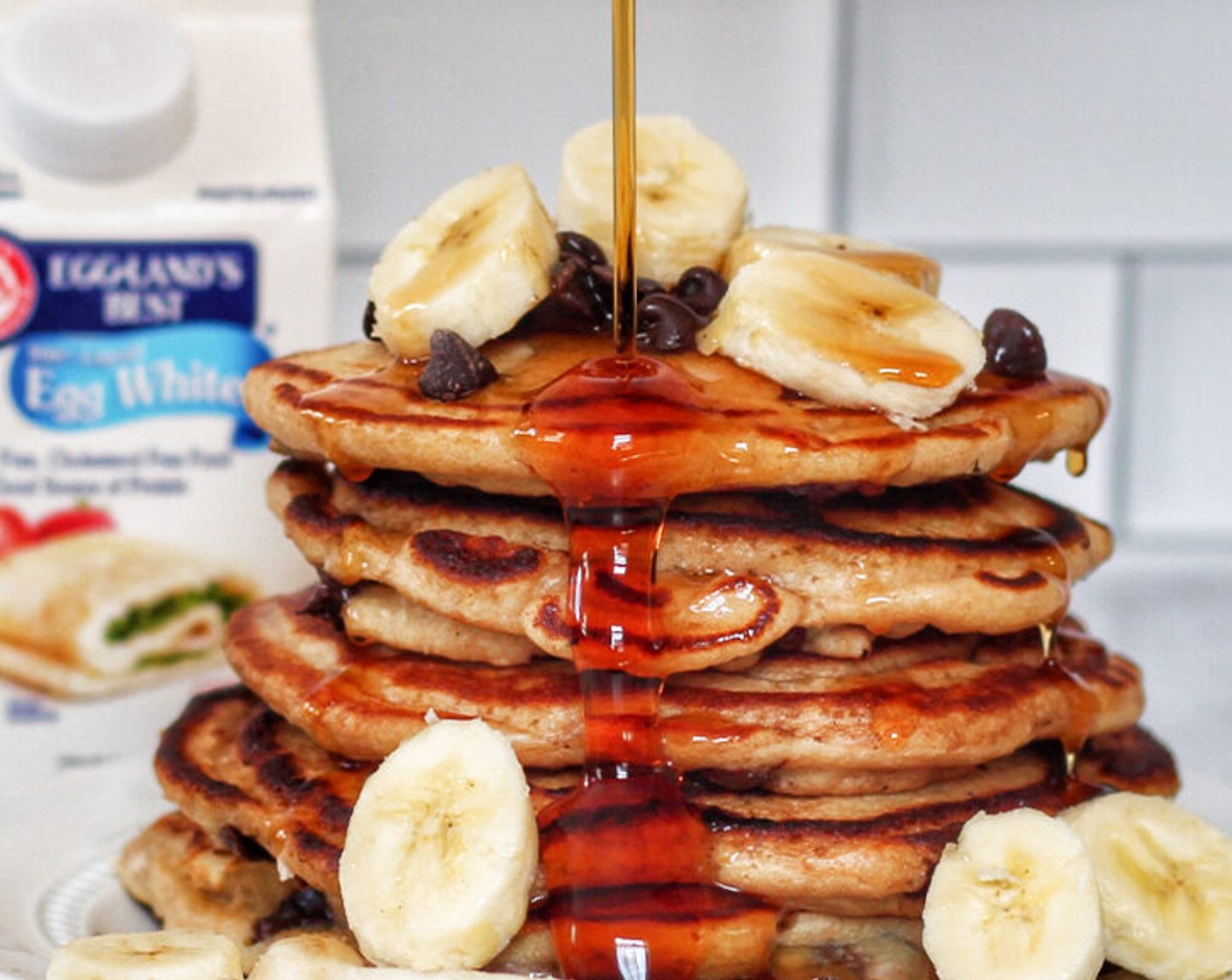 step 6 Stack pancakes and top with maple syrup and more bananas, and chocolate chips, and enjoy!