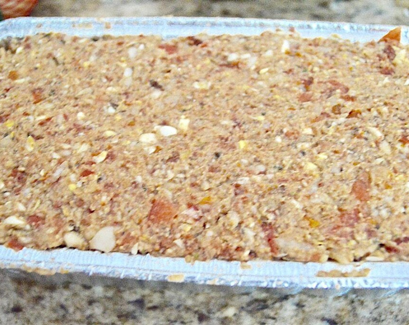 step 3 Transfer to a large mixing bowl and mix the Seasoned Breadcrumbs (1 cup) and Salt (1 pinch) in thoroughly, then press the mixture firmly into the loaf pan, really packing it down.