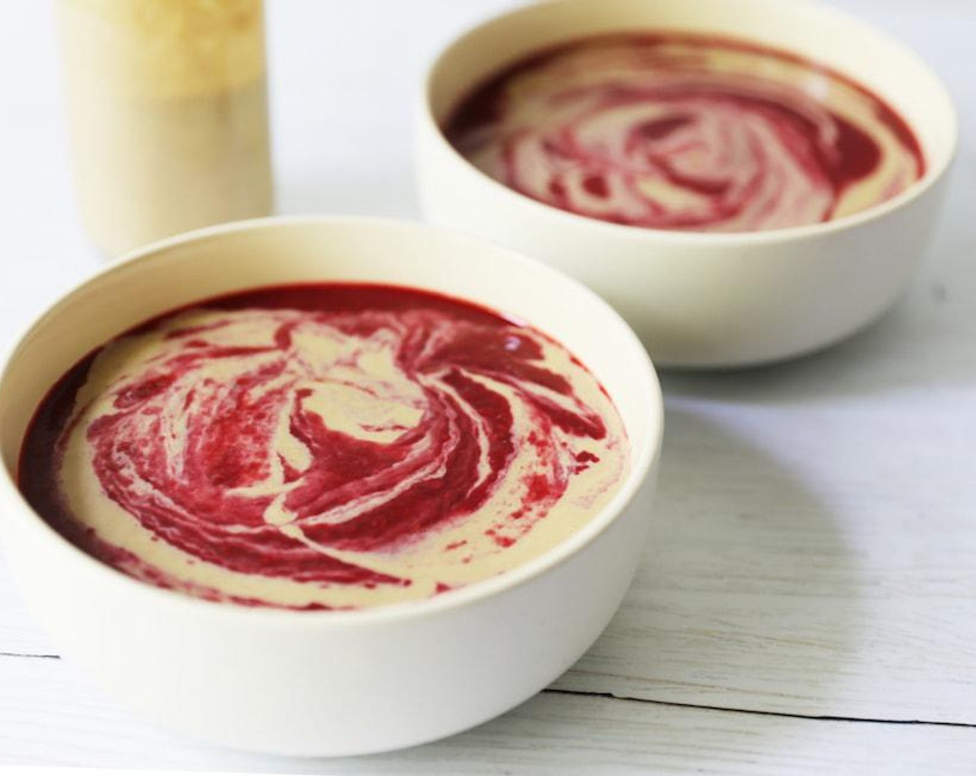 step 4 Divide into two bowls and top with banana milk and berries. Serve immediately Enjoy!