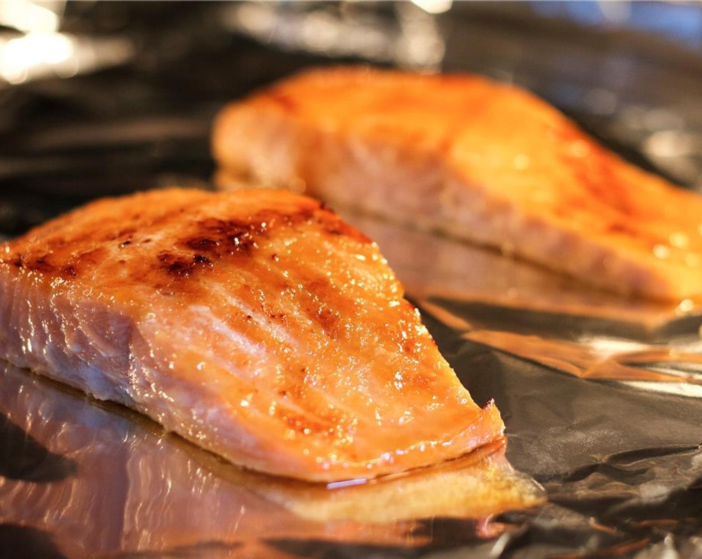 step 10 Place the salmon fillets on a sheet pan lined with foil and place in the one to roast for 9 minutes or until desired doneness, and hold for plating.