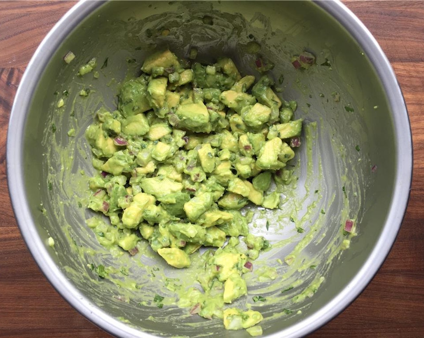 step 8 Combine the diced ripe avocados, juice from Lime (1), Fresh Cilantro (1 Tbsp), Red Onions (2 Tbsp), Extra-Virgin Olive Oil (1 Tbsp) and Kosher Salt (1/4 tsp). Mix well and refrigerate until ready to use.