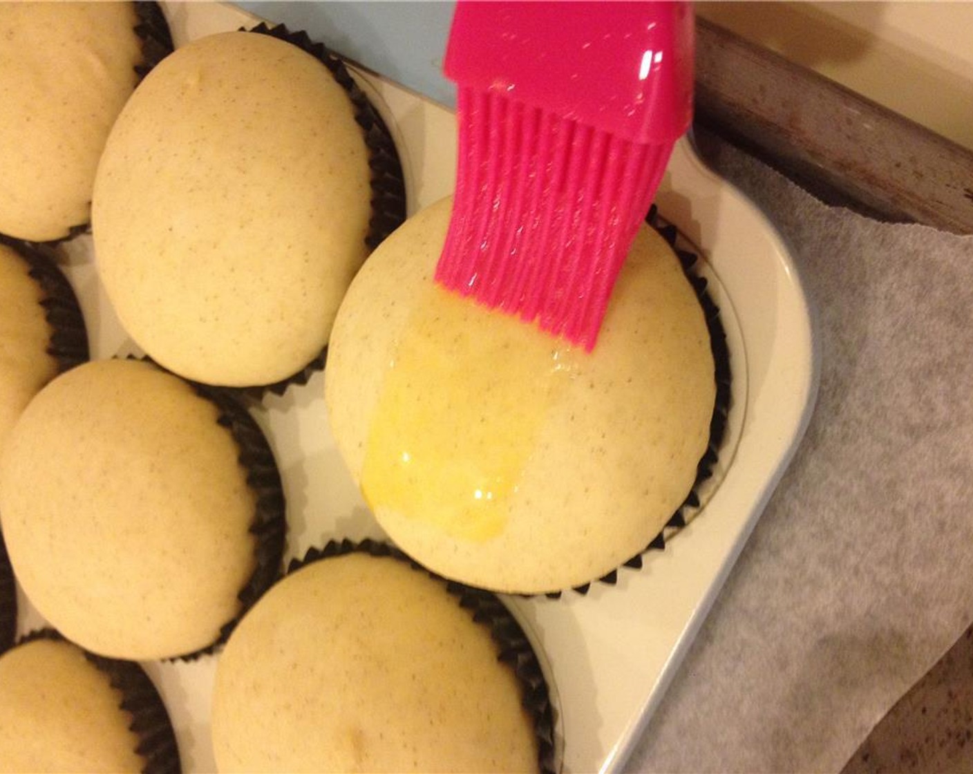 step 17 Preheat oven to 180 degrees C (350 degrees F). Beat together an Eggland's Best Classic Egg (1) and Milk (2 Tbsp) to make an egg wash. Brush the egg wash on top of each bun.