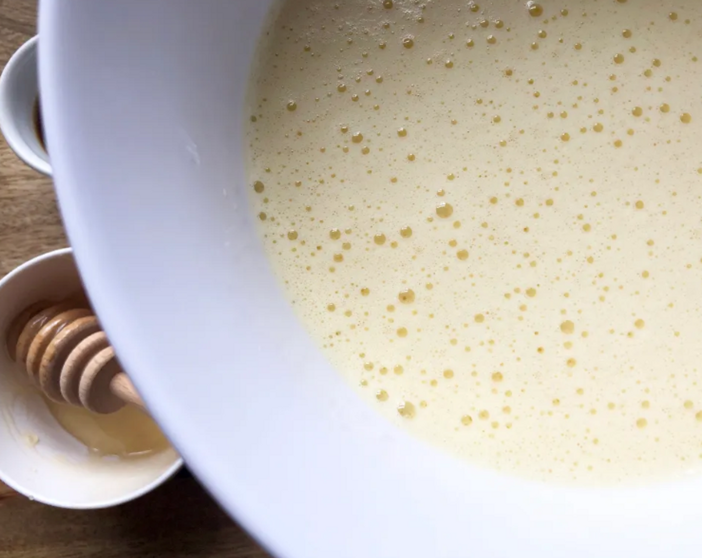 step 3 In a medium bowl, beat the Farmhouse Eggs® Large Brown Eggs (6) and Honey (1/3 cup) until pale and fluffy.