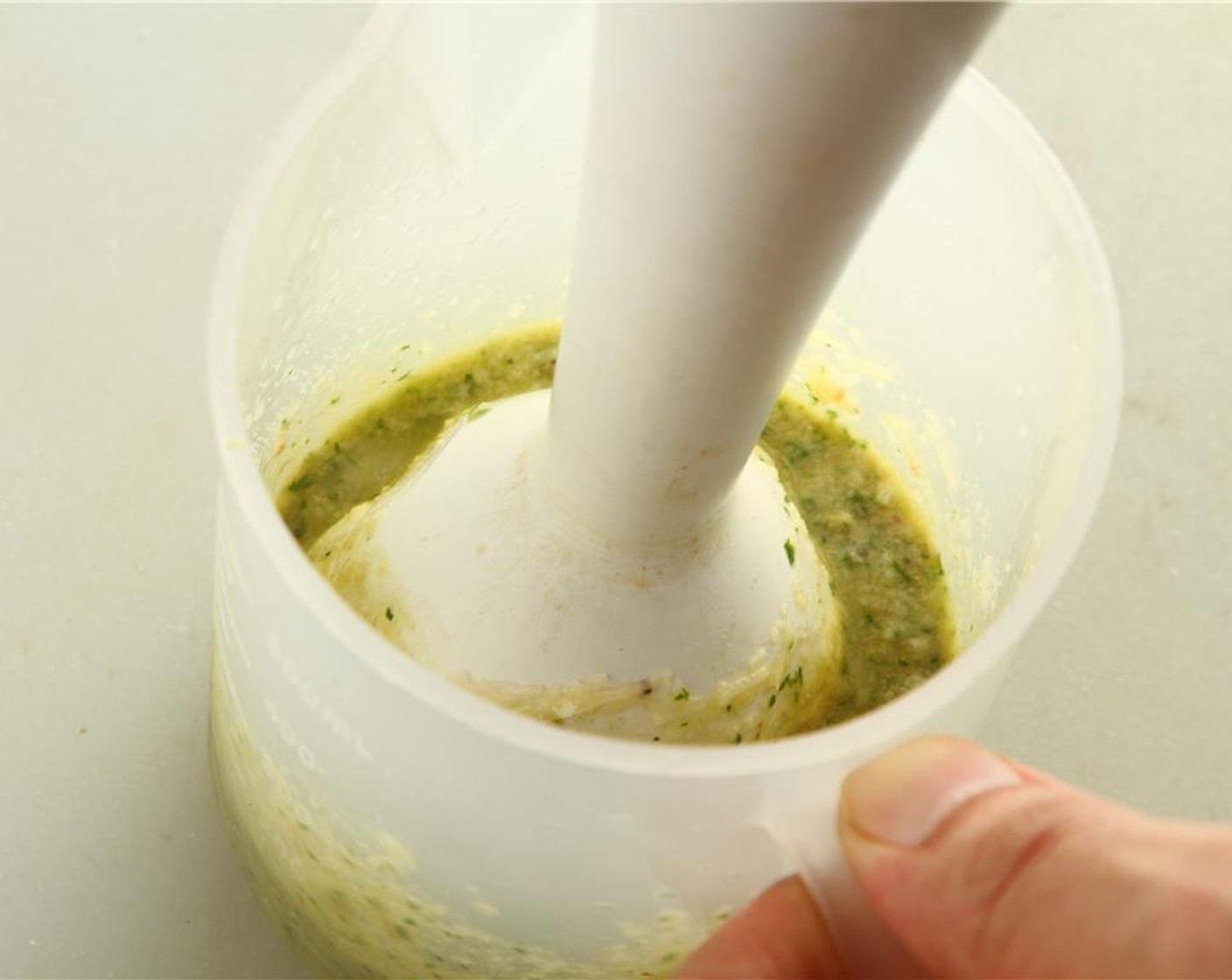 step 6 Using an immersion blender, blend everything together until the dressing is smooth and fully combined.