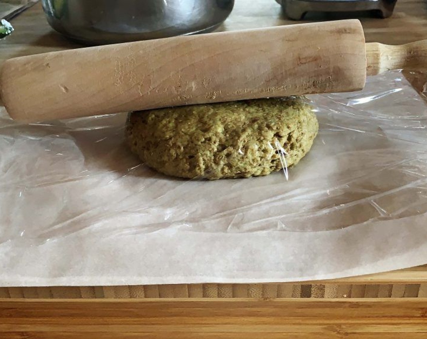 step 4 Roll out the dough in between 2 sheets of parchment papers and refrigerate for a few hours.