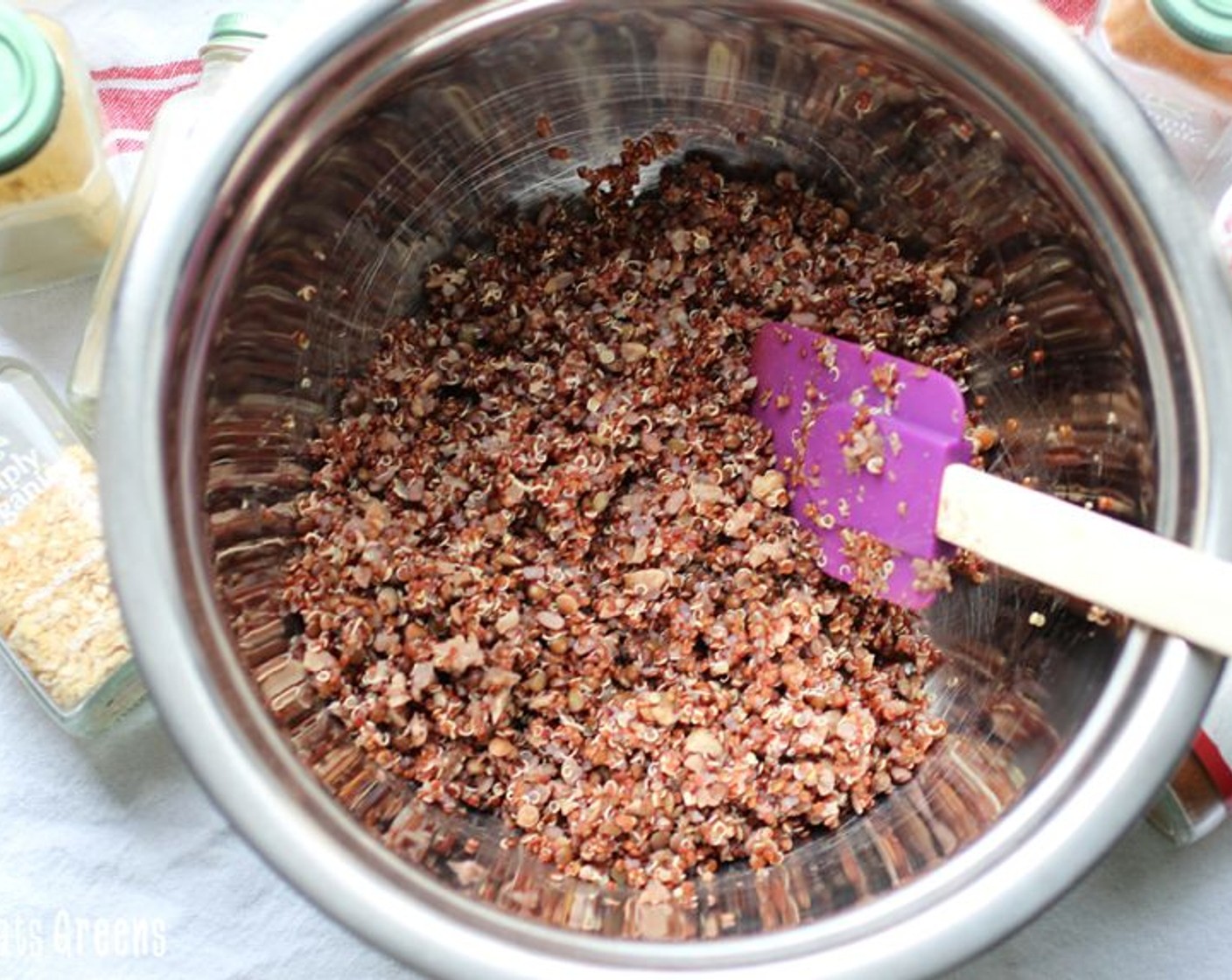 step 6 Combine the cooked lentils, quinoa, Minced Dried Onion (1/2 tsp), Cayenne Pepper (1/2 tsp), McCormick® Garlic Powder (1/2 tsp), Chili Powder (1/2 tsp), Liquid Smoke (1/2 Tbsp), and Salt (to taste) and Ground Black Pepper (to taste) in a large bowl.